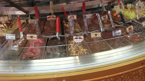 Gelato tubs in a cabinet